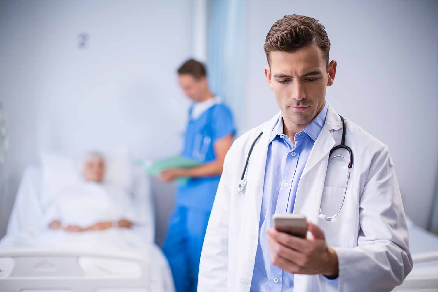 [Image: Doctor-on-ward-using-cell-phone-1500-x-1000.jpg]